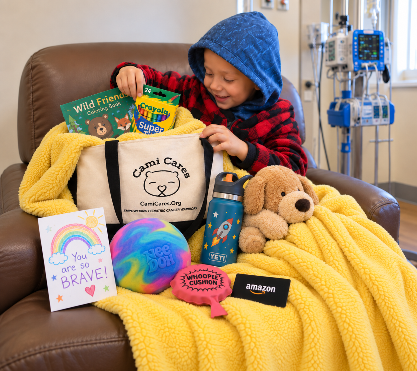 Young boy receiving a Cami Cares comfort bag