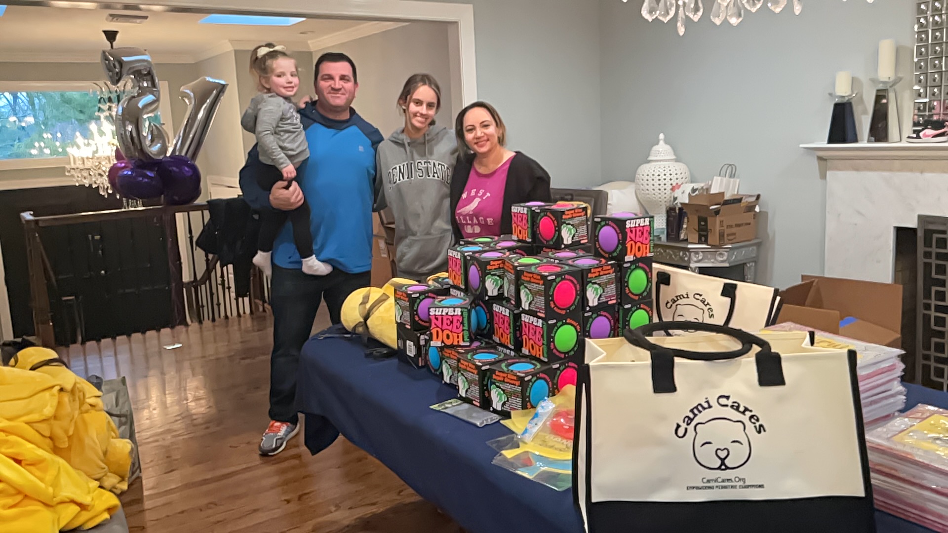 Cami Parmelee holding a Cami Cares comfort bag