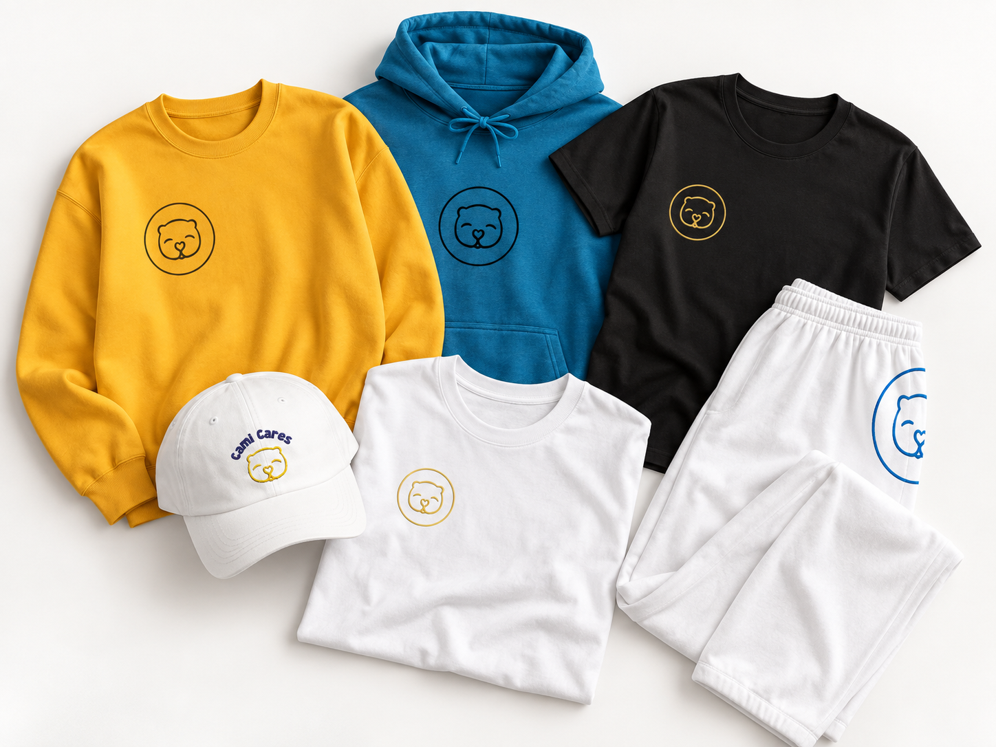 Cami Cares merchandise collection featuring a yellow sweatshirt, blue hoodie, black and white T-shirts, white cap, and white lounge pants